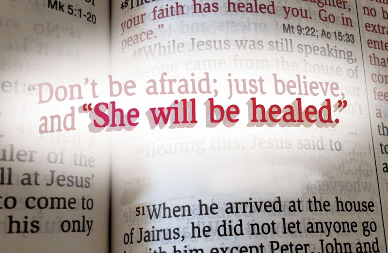 Sue's healing verse is highlighted on a page of the Bible.