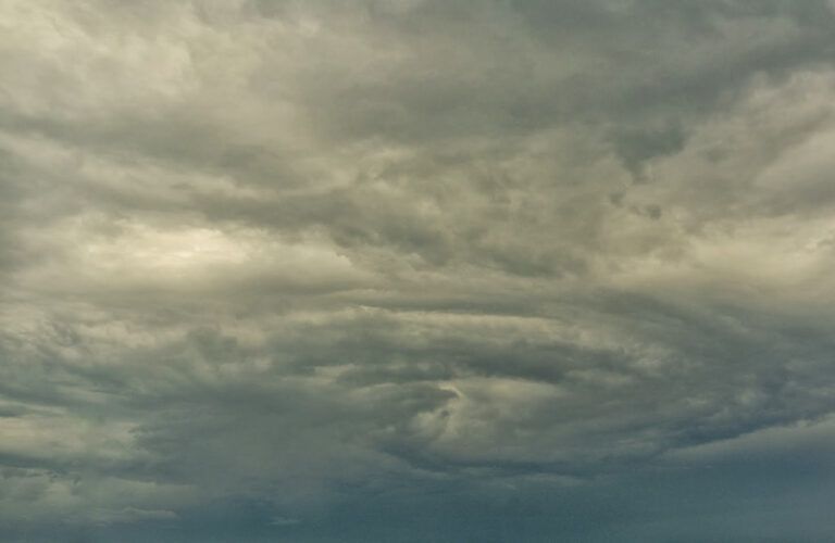 The eye of a menacing storm cloud