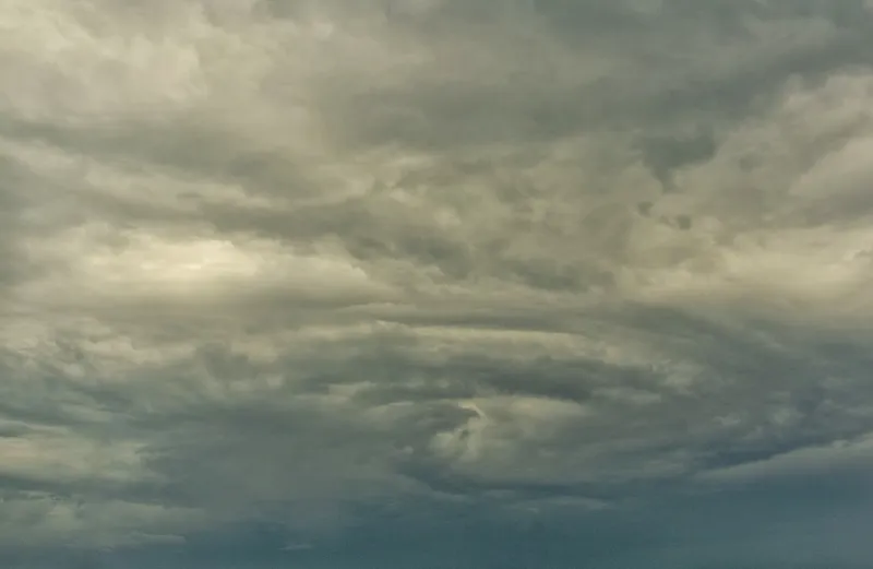 The eye of a menacing storm cloud