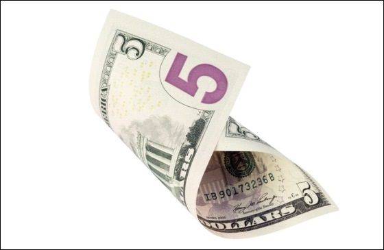close-up of a five-dollar bill.