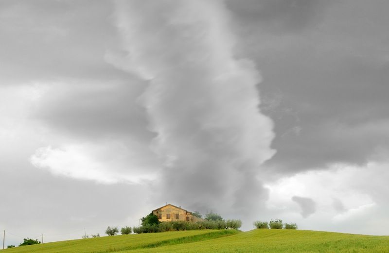 Tornado approaching a house