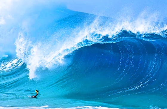 Clark takes a breathtaking photo of a massive wave.