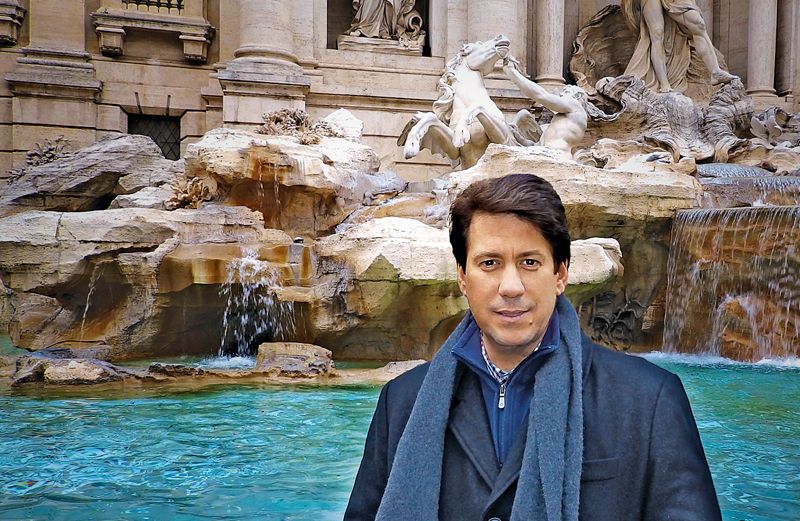 Anthony DeStefano beside the Trevi Fountain