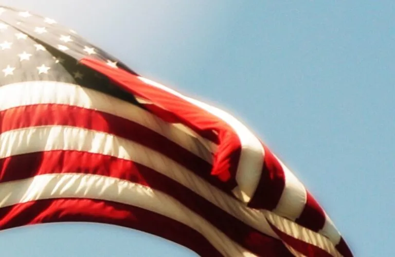The American flag in the sun.