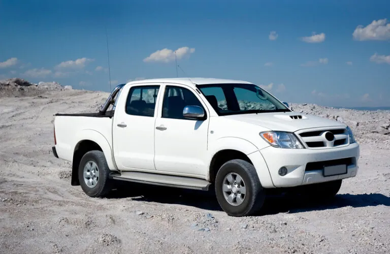 A sparkling white pickup truck