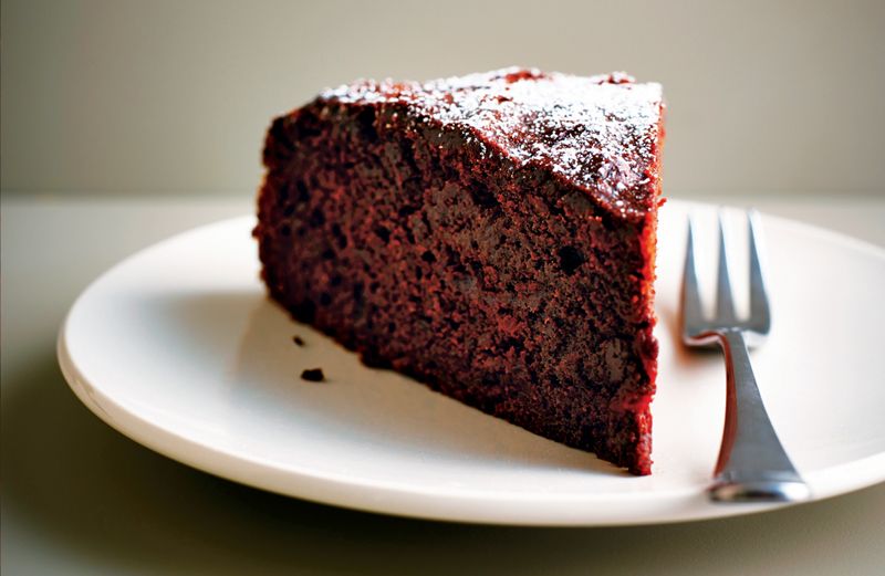 A slice of Lorraine Pascale's Fudgy Orange and Beet Cake