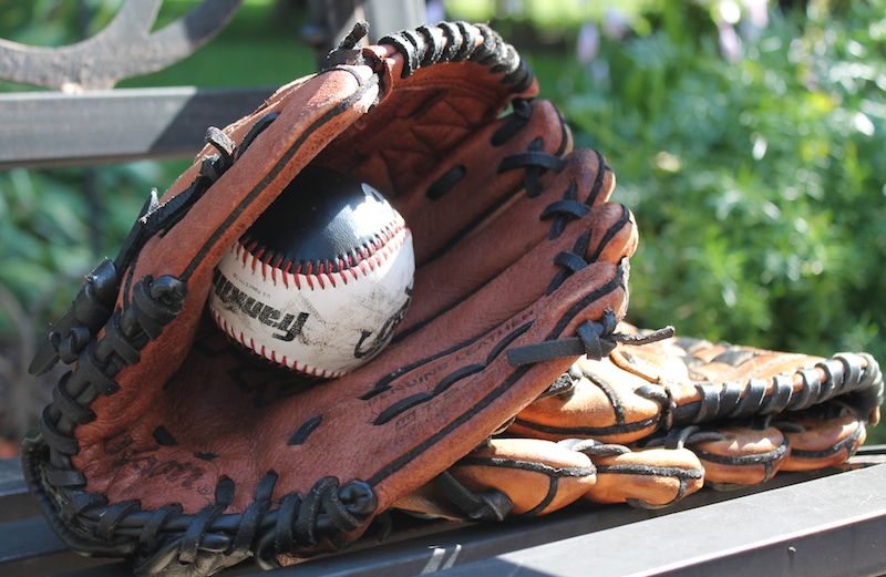A baseball glove at the park