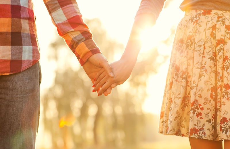 Photo of teen couple holding hands by 123RF(r)