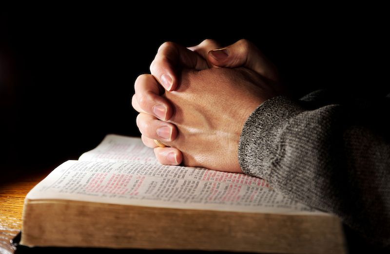 Photo of praying hands by Lincoln Rogers for Thinkstock, Getty Images