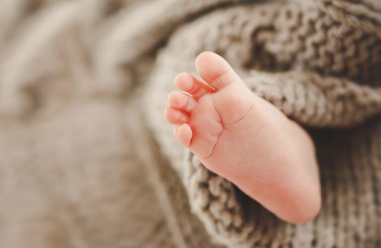 Close-up of a precious baby foot