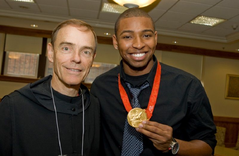 Father Edwin Leahy with student Cullen Jones