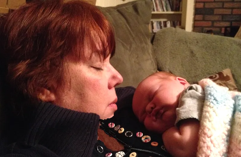 Peggy Frezon with her first grandchild, Grace