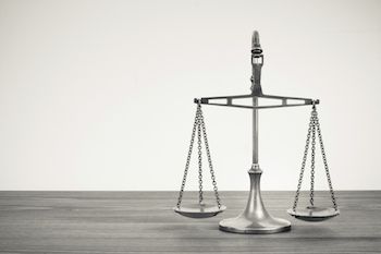 Scales of justice. Photo BrAt_PiKaChU, Thinkstock.