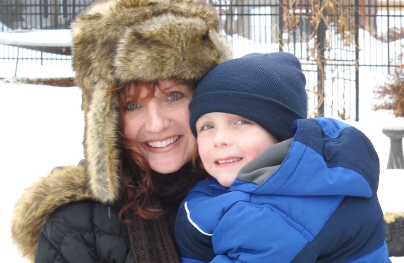 Shawnelle and her son enjoy the first snow of the season.
