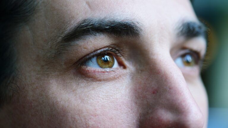 Man's eyes looking up to the sky as a thing to do during lent