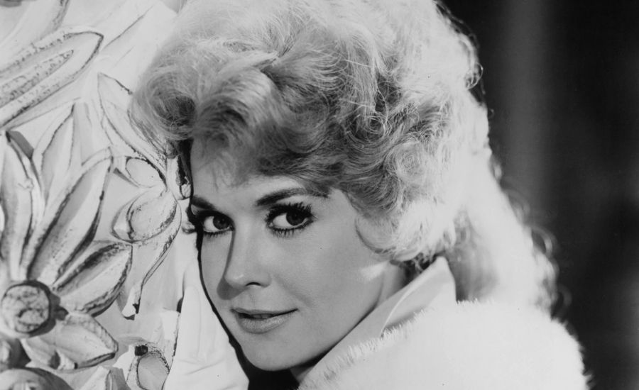 Donna Douglas as Elly May Clampett