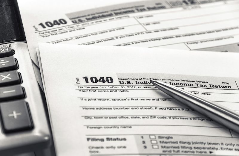 Tax forms. Photo by Drazen, Thinkstock.