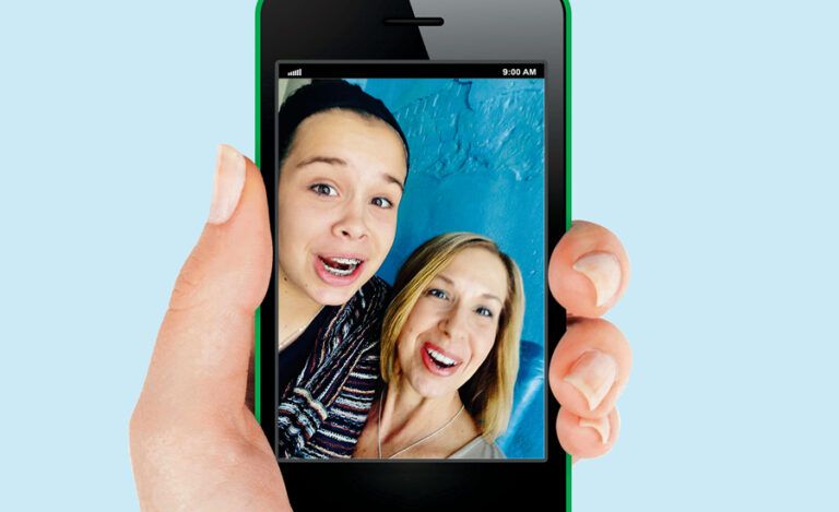 Stephanie and Micah in a selfie on a smartphone screen