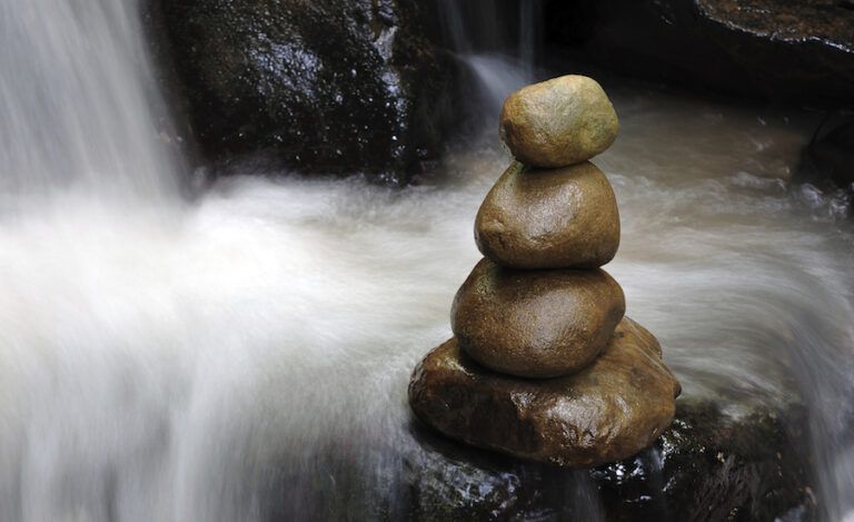 Stones balancing in a stream