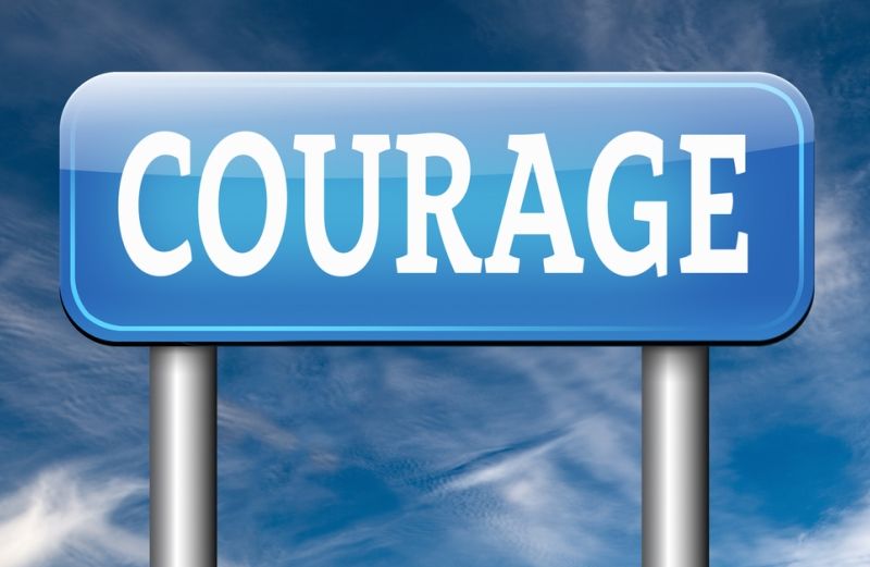 Illustration of a sign with the word courage: Shutterstock