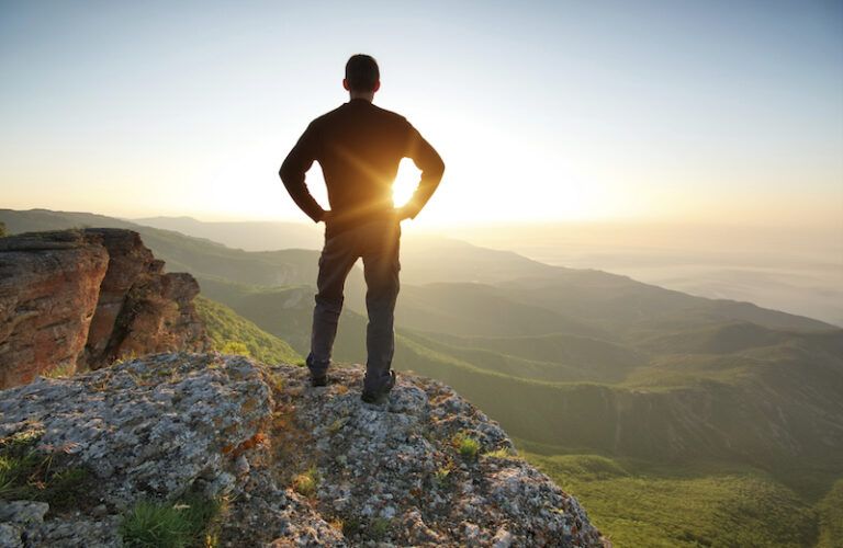 Man on a mountaintop. Photo by Toltek, Thinkstock.