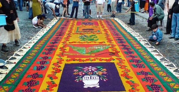 Colorful stenciled carpets made of sawdust, in Guatemala.