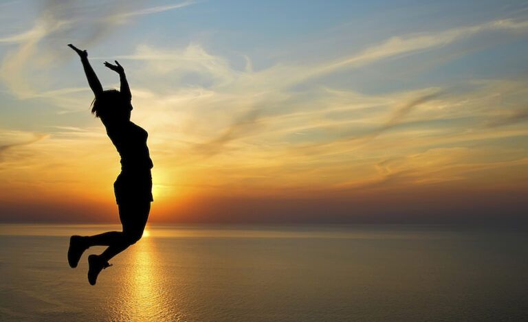 Woman leaping. Thinkstock.