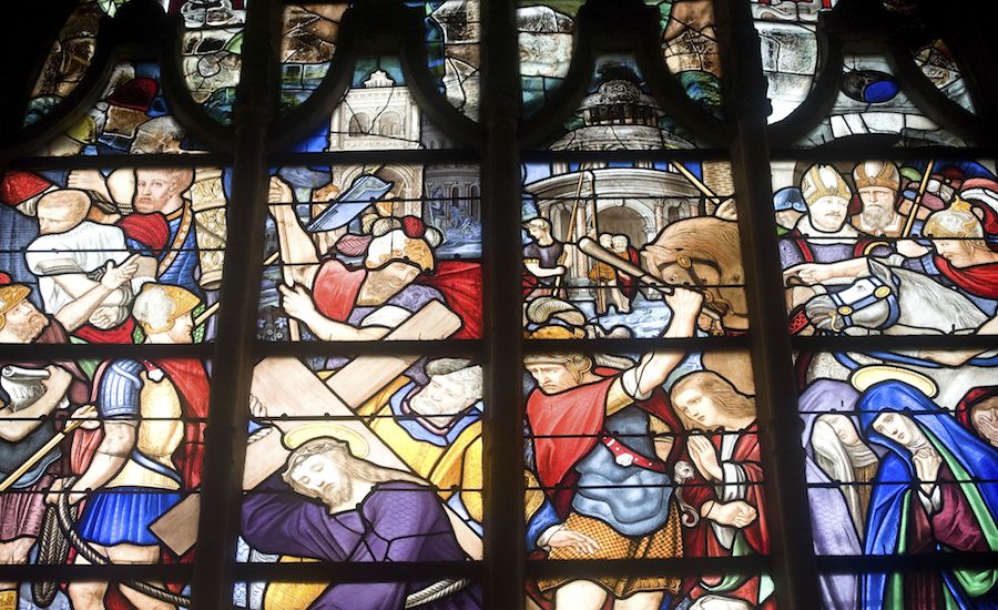 La Ferté-Bernard (France) - Gothic church interior, stained glass window. Thinkstock.
