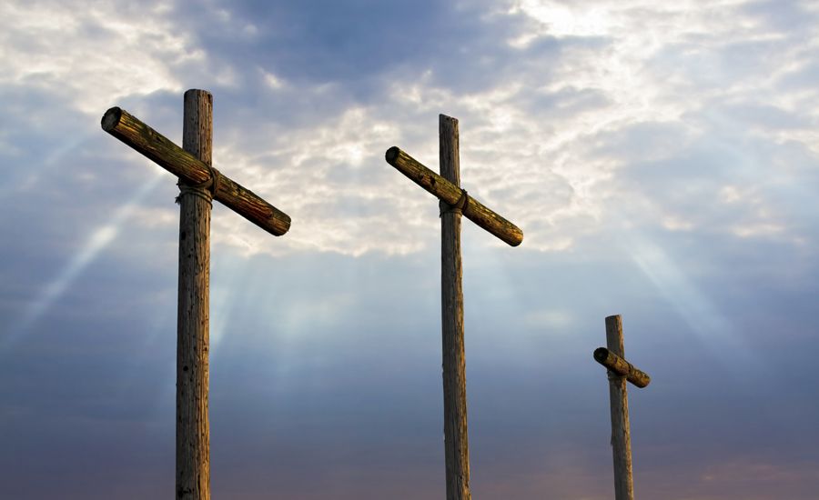 Three crosses at Calvary at dawn to signify Good Friday reflection