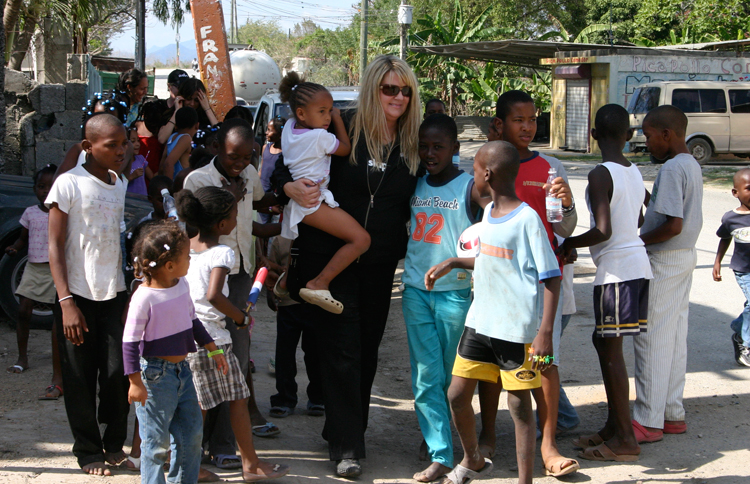 Shelene strolls with a group of children in the Dominican Republic.