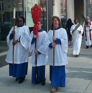 Members of the St. Michaels Church in New York do their Palm Sunday parade