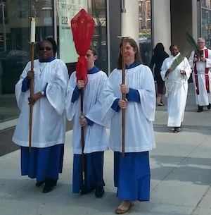 Members of the St. Michaels Church in New York do their Palm Sunday parade