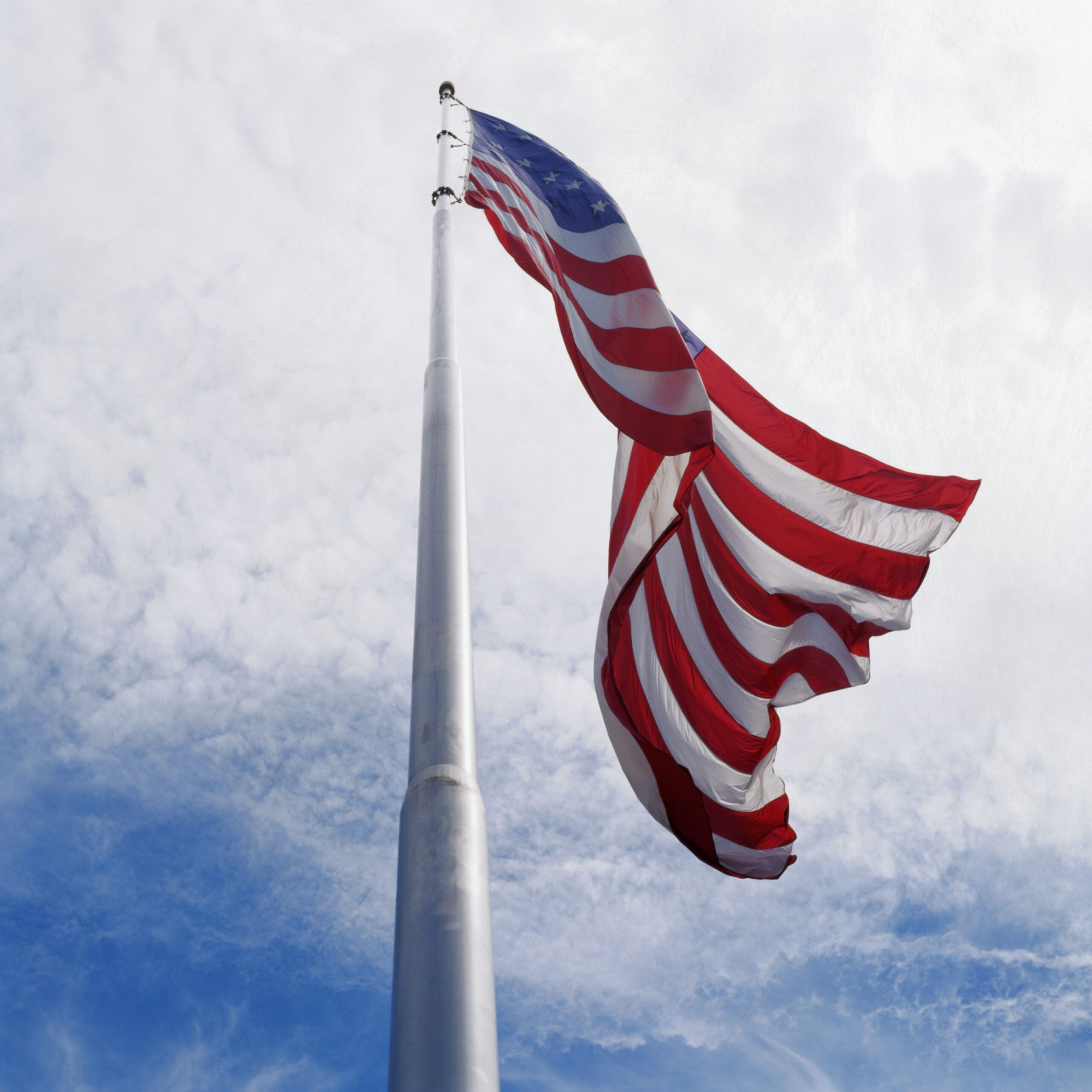 American flag flies on Memorial Day at half staff