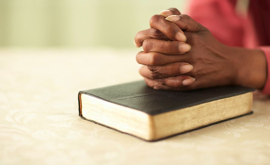 Hands clasped in prayer (Thinkstock)