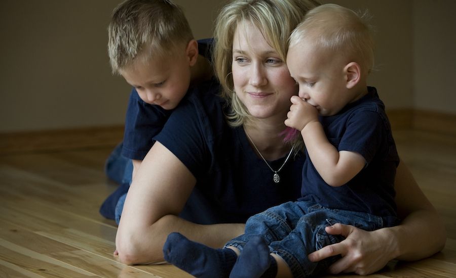 Mother and two sons. (Thinkstock)
