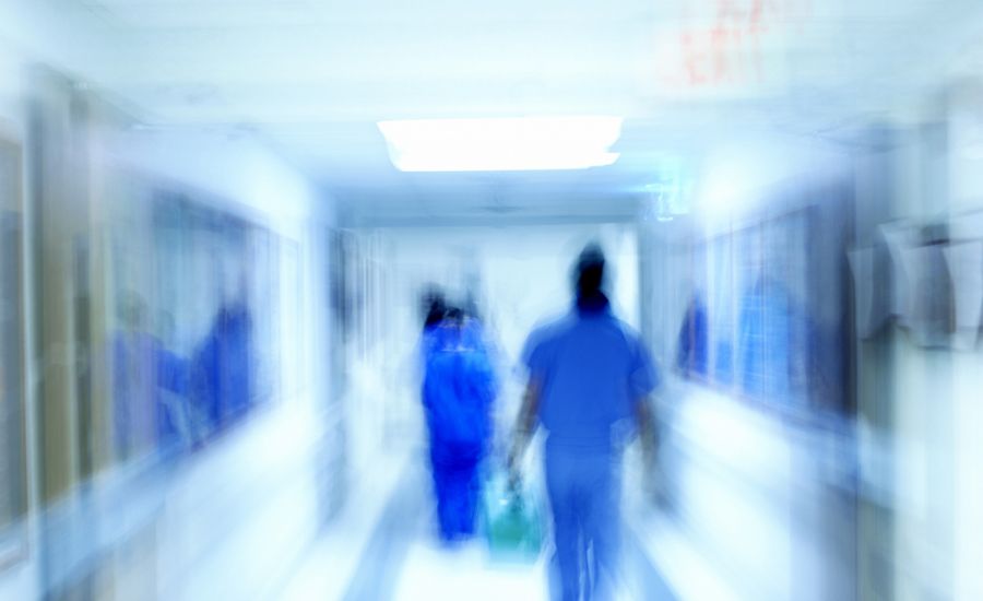 hospital hallway in a blue, dreamlike blur