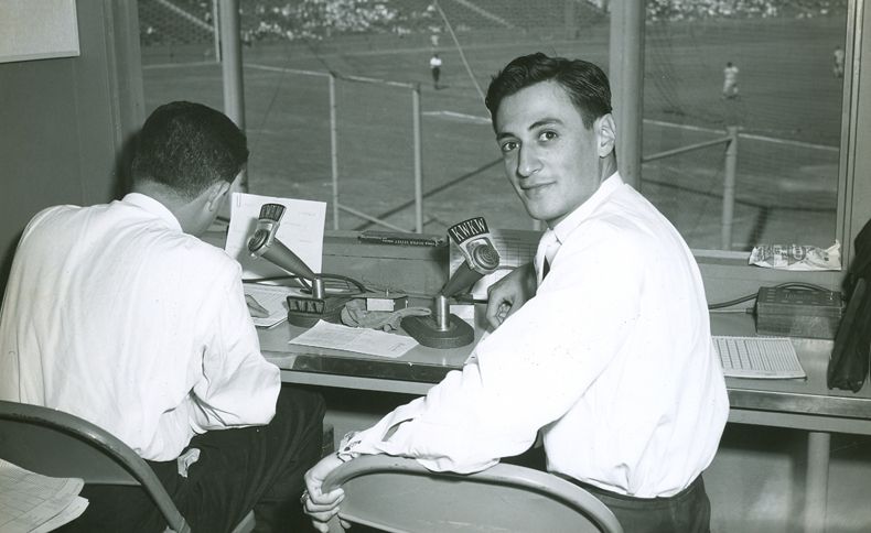 Jaime Jarrin is seen in the Dodgers press box in this photograph from the 1950s.
