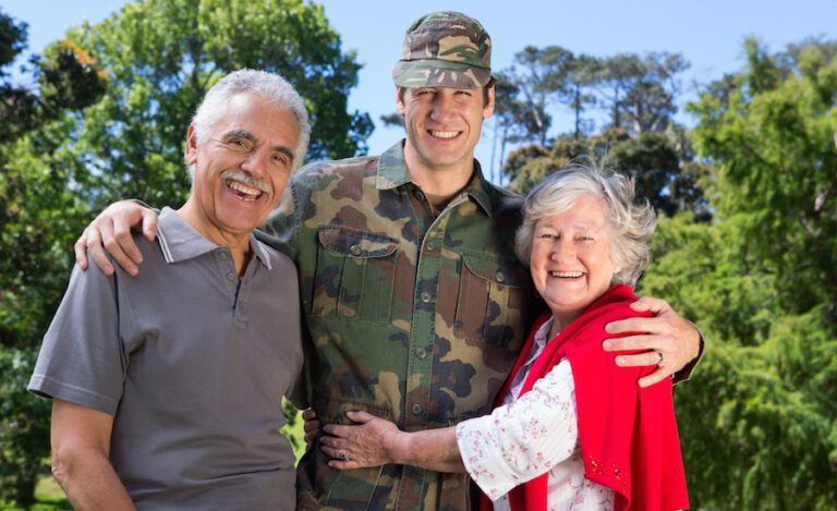 Parents with their soldier son.