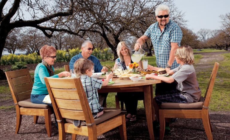 Guideposts: Food Network start Guy Fieri enjoys a meal al fresco with his family.