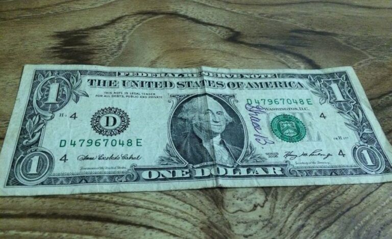 The dollar bill signed by Peter Bilello's wife, Grace. Years later, he got the bill back.
