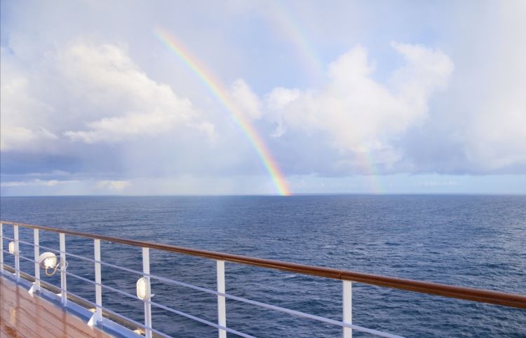A cruise to Canada with a rainbow in the background