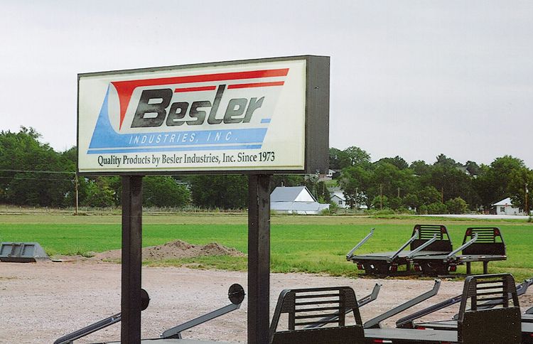A large sign advertising a business called Besler Industries. Besler was Max's last name.