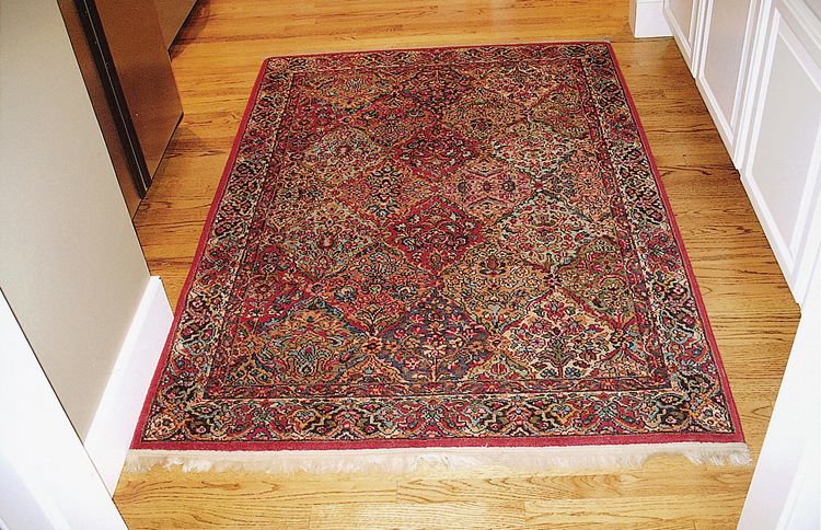 The antique Persian rug that Janis moved into the home she would share with her new husband, Jim Durham