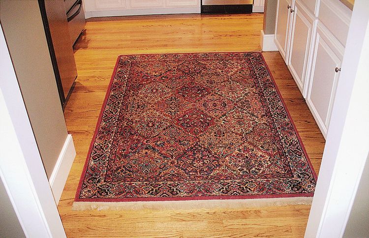 Janis's antique Persian rug, which was shifting in the night without anyone having walked on it
