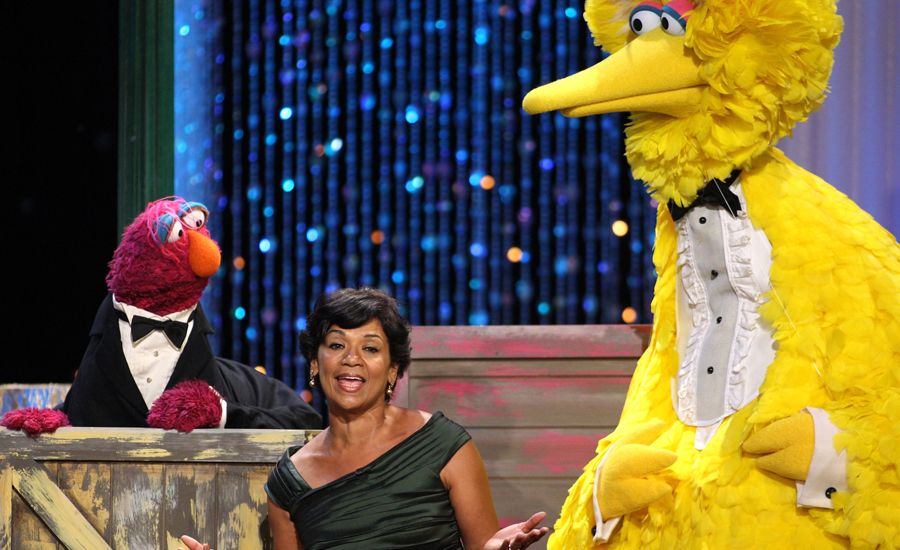 Actress Sonia Manzano, seen here with two of her Sesame Street pals, is leaving the show after nearly 45 years.