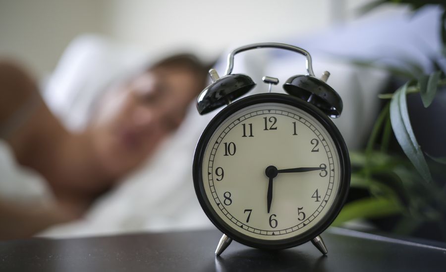 Alarm clock, woman sleeping