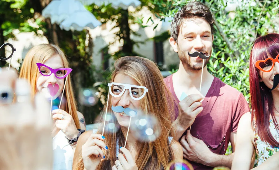 Group wears masks at a party