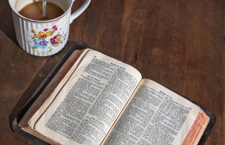 Bible and morning cup of coffee - starting the day with prayer