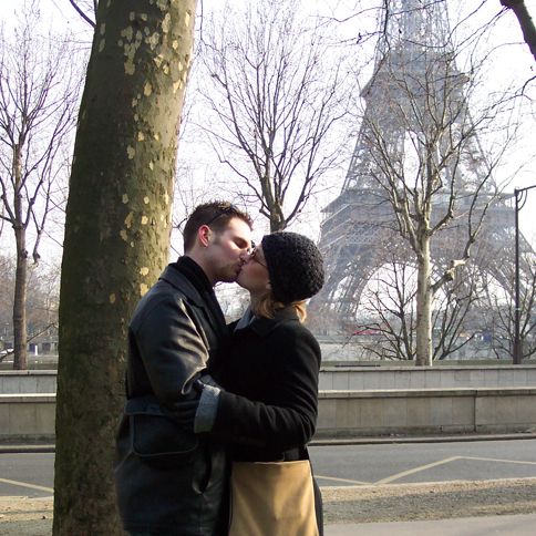 Guideposts: Jason and Jessica smooch in front of the Eiffel Tower in Paris.