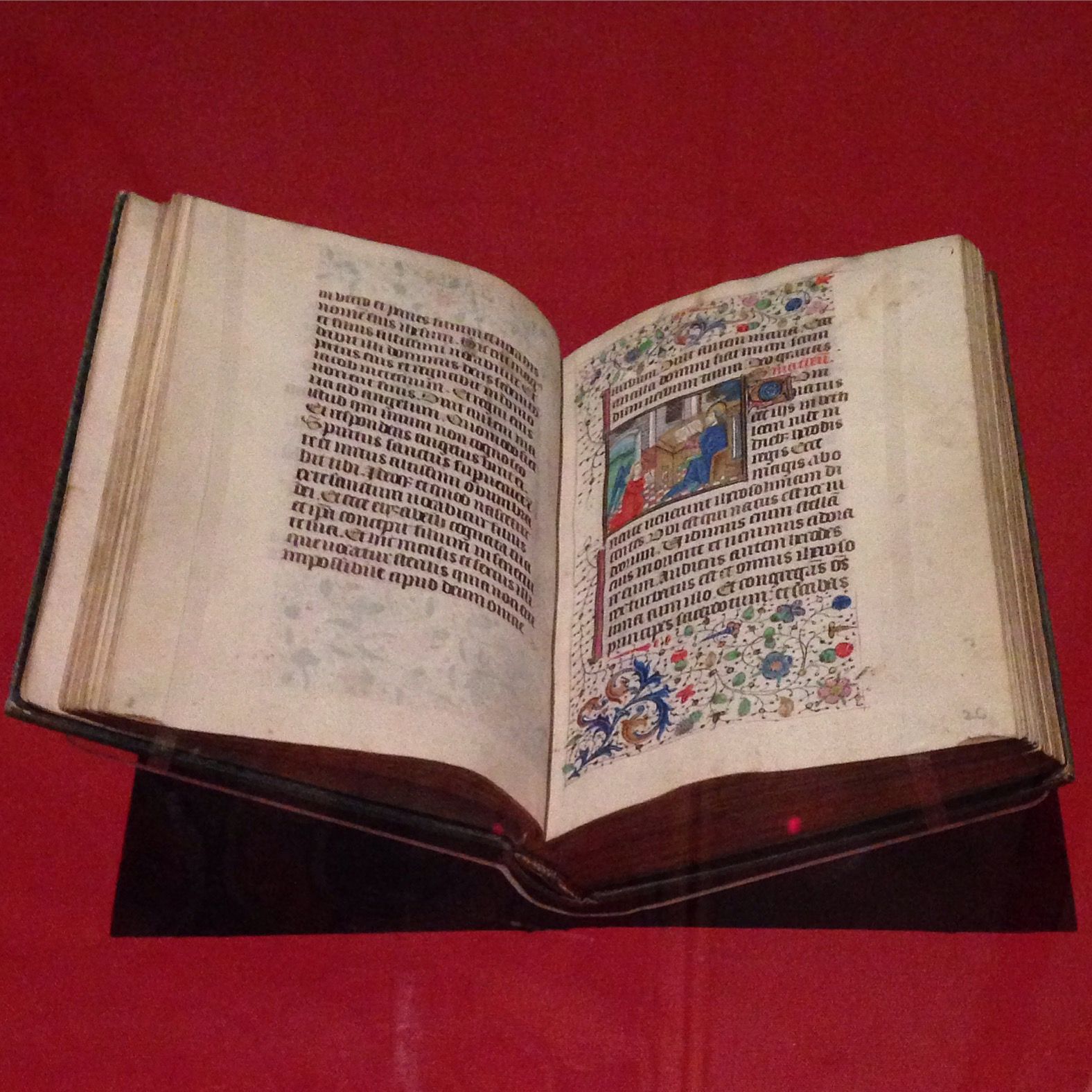 A devotional book from the 15th century on display at the Trinity College Library in Dublin, Ireland. The illustration depicts St. Matthew at his desk.